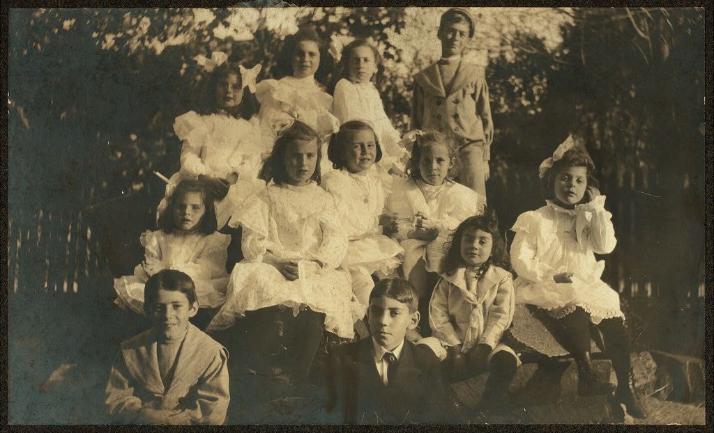 A large group of children outdoors